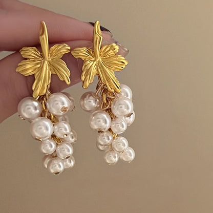 French retro pearl tassel earrings with a niche design and fairy like temperament